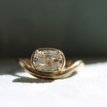 white elongated cushion cut diamond ring