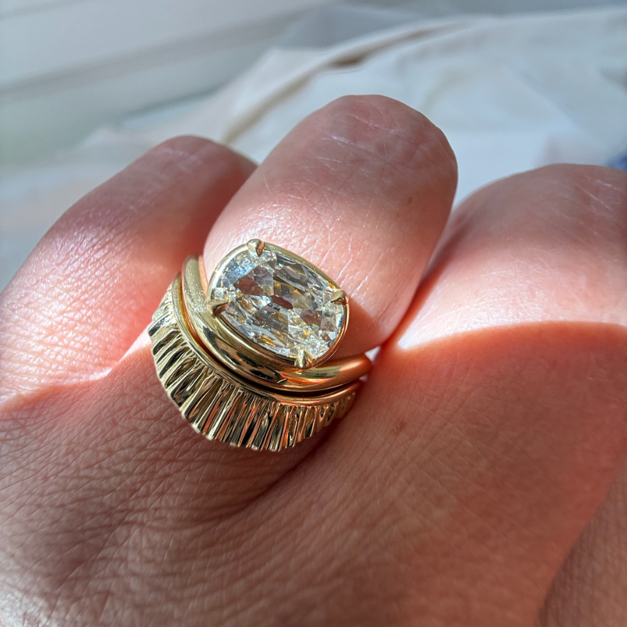 white elongated cushion cut diamond ring