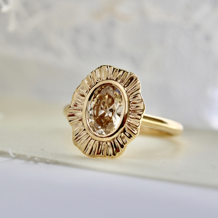 champagne oval cut diamond ring
