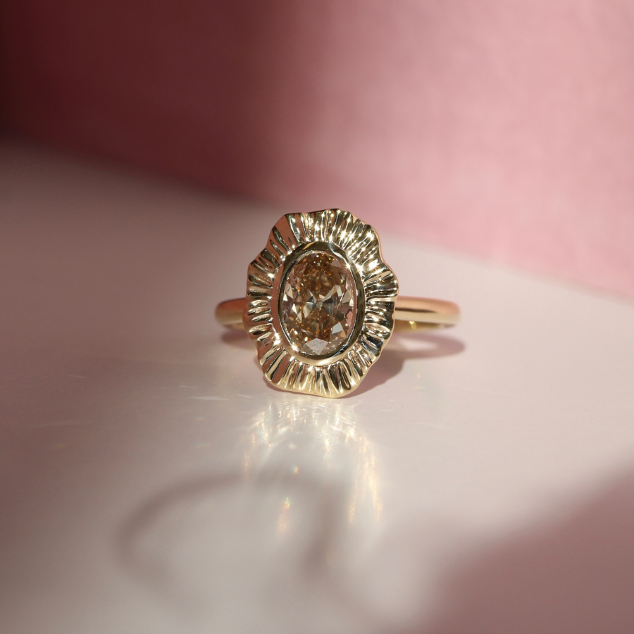 champagne oval cut diamond ring