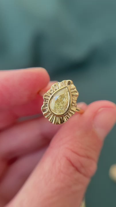 yellow pear cut diamond ring