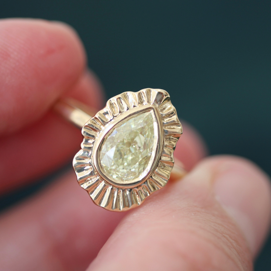 yellow pear cut diamond ring